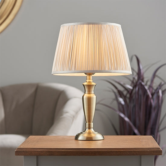 Oslo And Freya Small Oyster Shade Table Lamp In Antique Brass